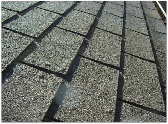 Blistered asphalt roofing shingle